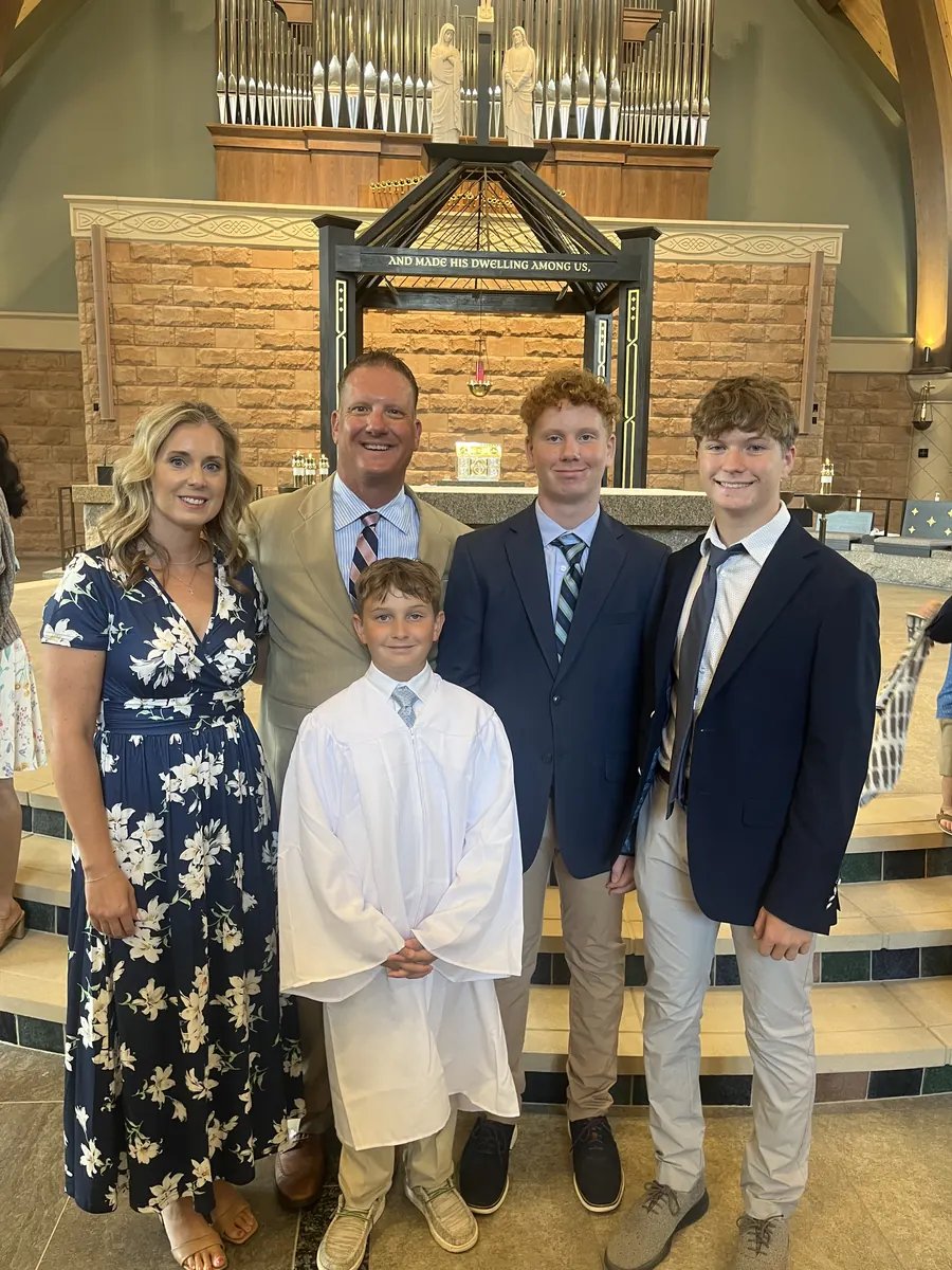 Matt Samson with wife Laura and their three sons at church