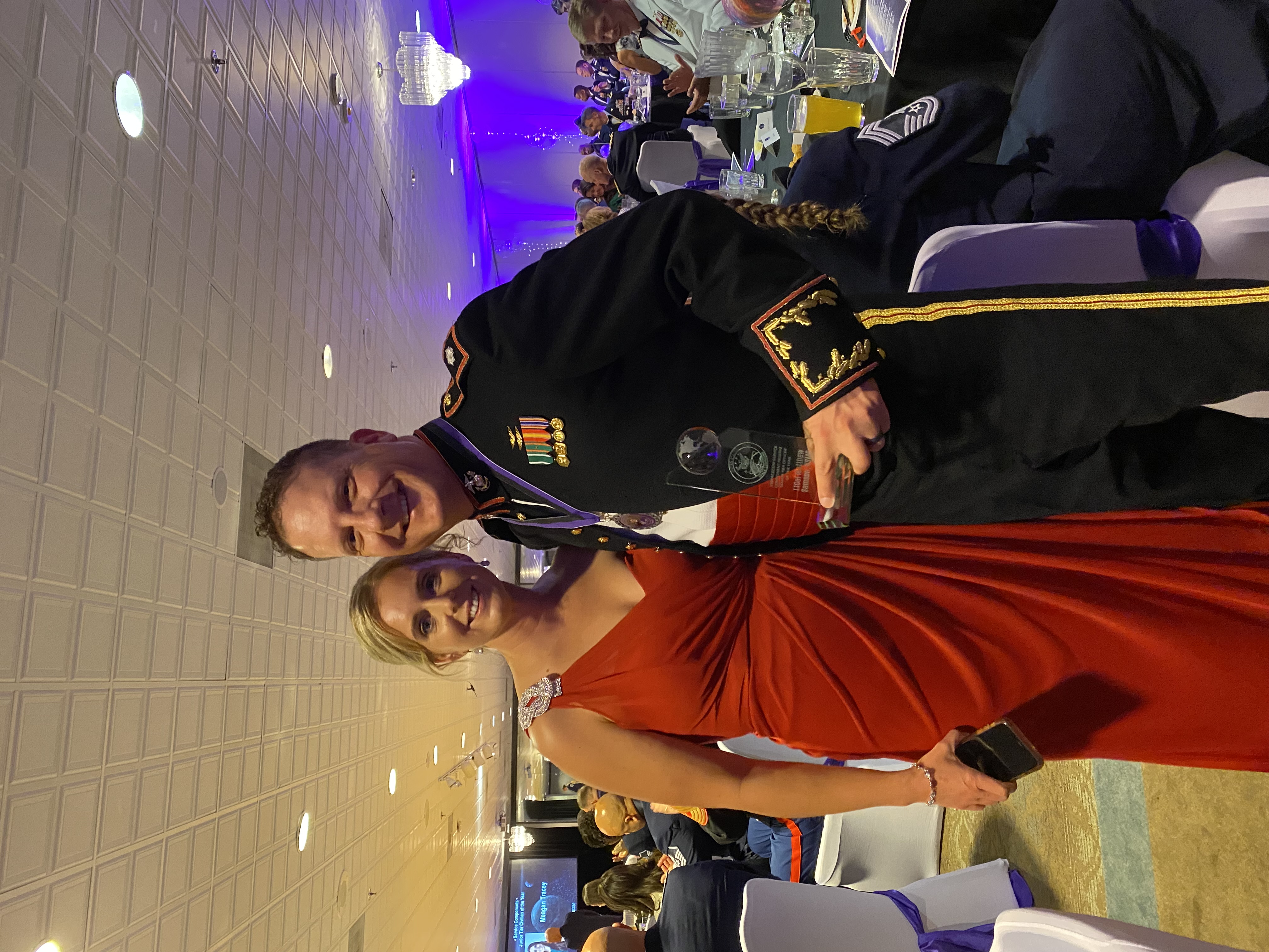 Matt Samson in USMC mess dress uniform receiving an award